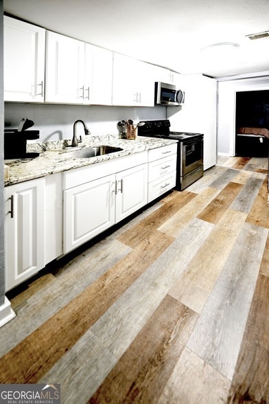 Building Photo - 539 Paines Ave NW