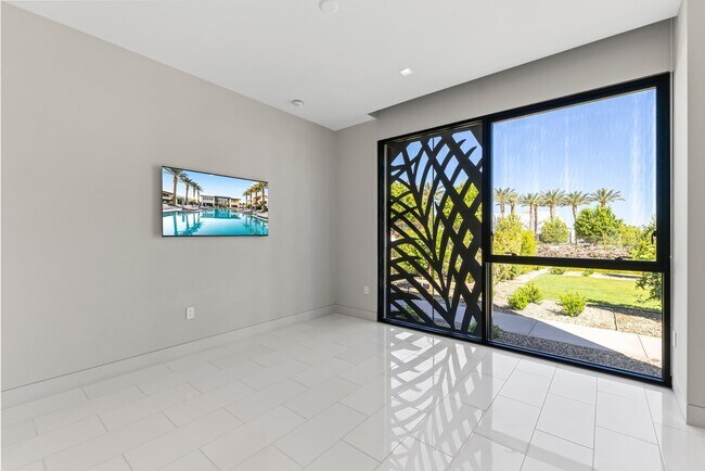 Building Photo - 6587 N Palmeraie Blvd