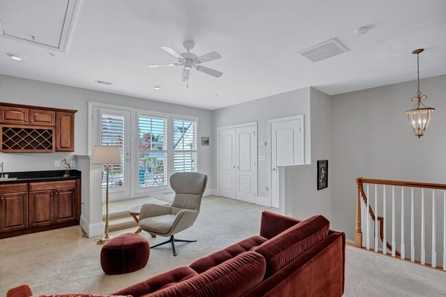 Building Photo - Stunning 4BR All-Brick End-Unit Townhome with Rooftop Terrace in Potomac Greens