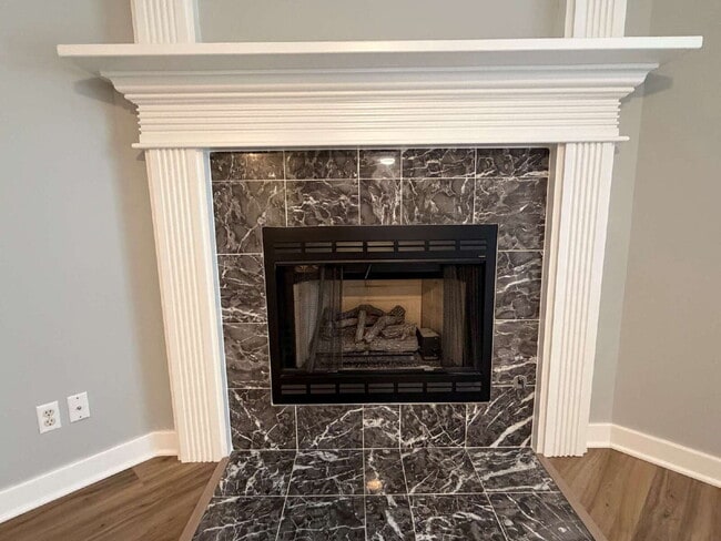 Building Photo - Elegant, Low Maintenance Townhome Designed for Elevated Everyday Living!