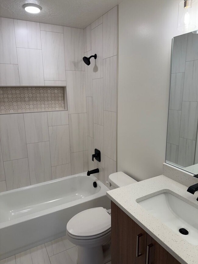 Building Photo - Half off first months rent - Beautiful townhome with 2 car garage, Central Air and Master Suite