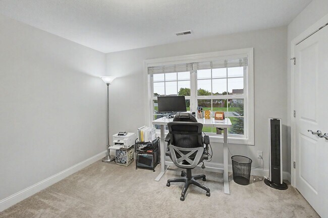 Building Photo - Spacious 4-Bedroom, 3.5-Bathroom Townhome & 2-Car Garage-West Champaign