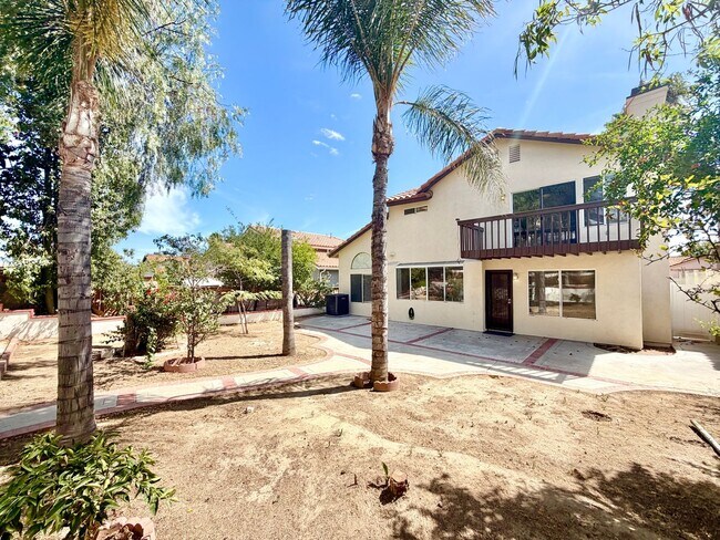 Building Photo - Spacious 5 Bedroom 3 Bathroom Home with Updated Paint, New Roof & Private Balcony
