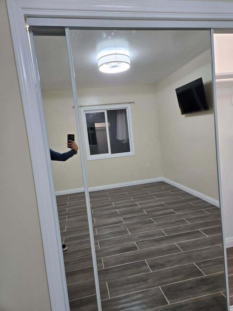 Sliding mirror closet doors inside bedroom - 2722 W 73rd St