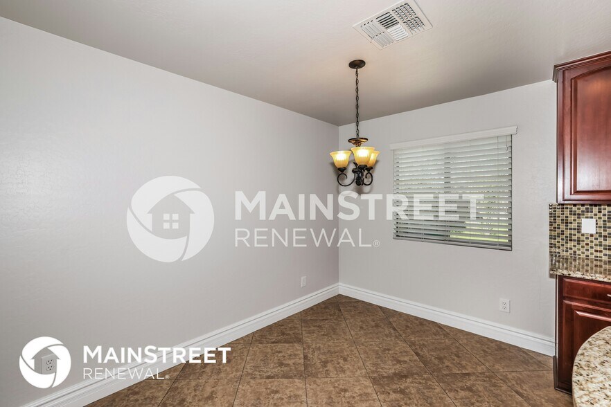 Building Photo - 11216 W College Dr