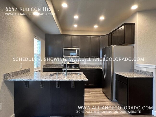 Building Photo - 6647 Rubicon Hts