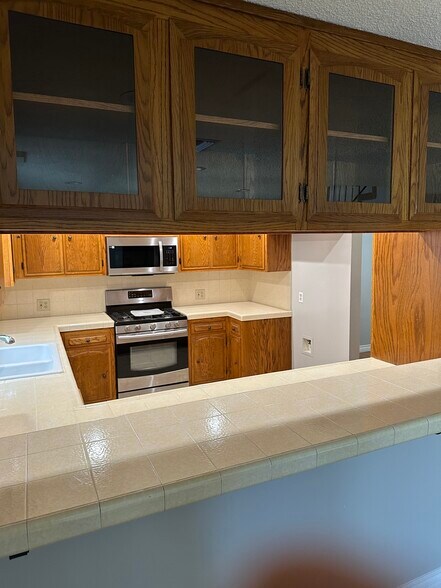 Kitchen with china cabinet - 17632 Los Alimos St