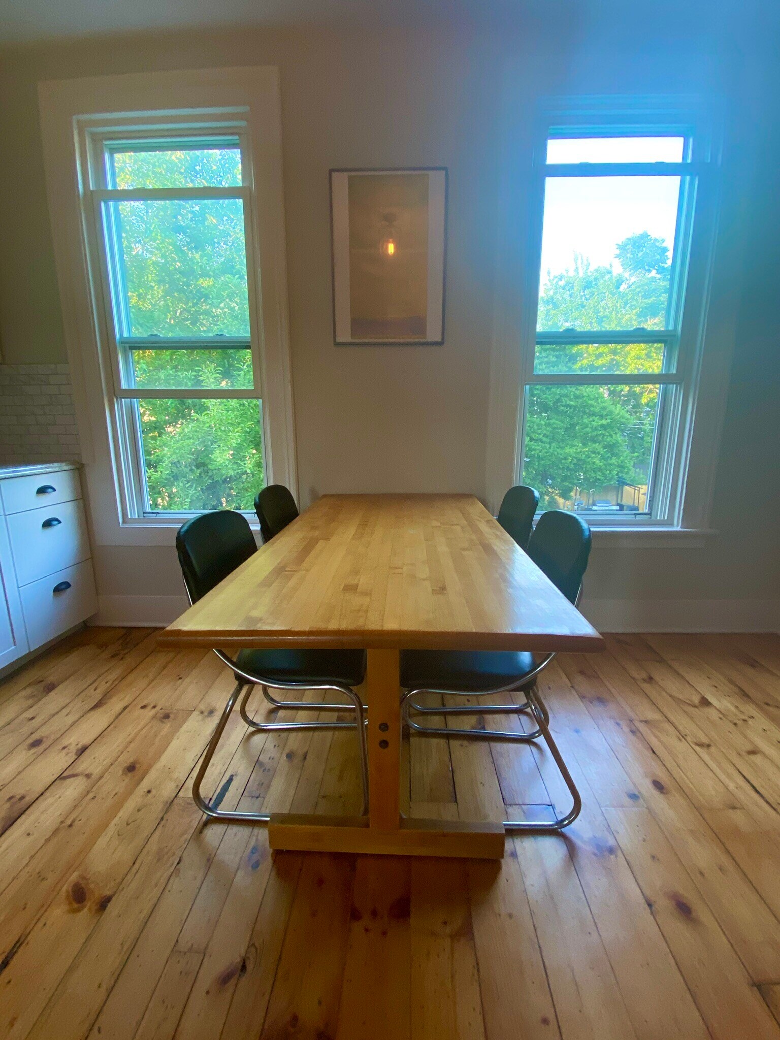 The butcher block table provides a great place to hang out or entertain - 55 Pearl St