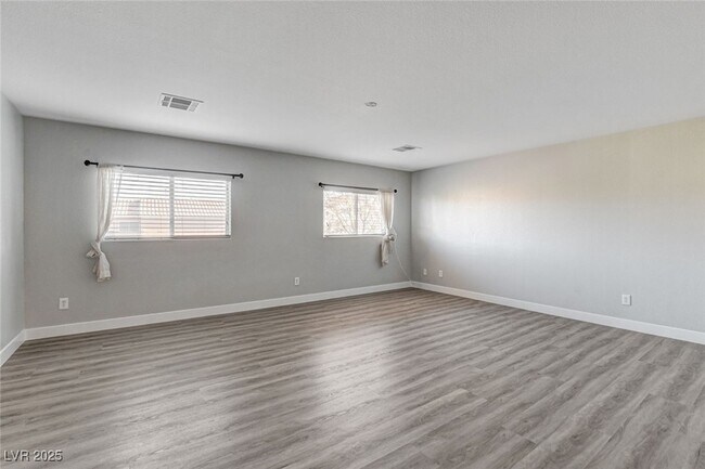 Building Photo - 9060 Candyland Ave