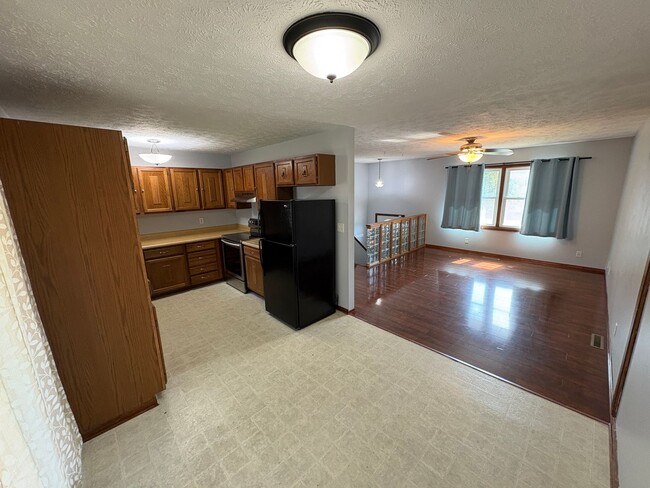 Building Photo - Spacious Single-Family Home with Fenced Backyard & Attached Garage