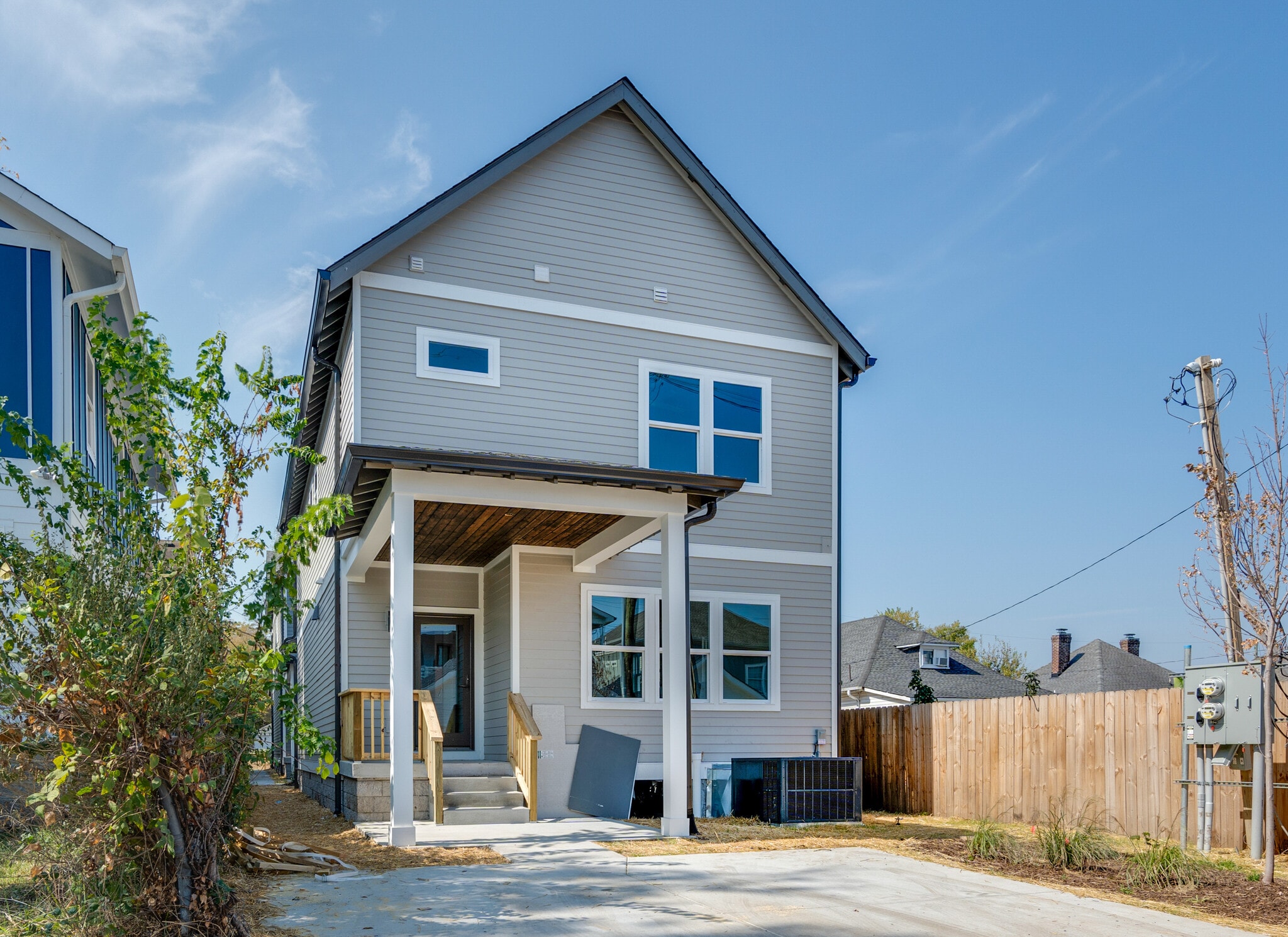Back patio with parking pad - 1912 10th Ave N