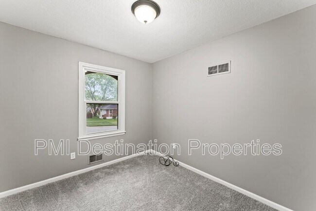 Building Photo - 12012 E 56 St