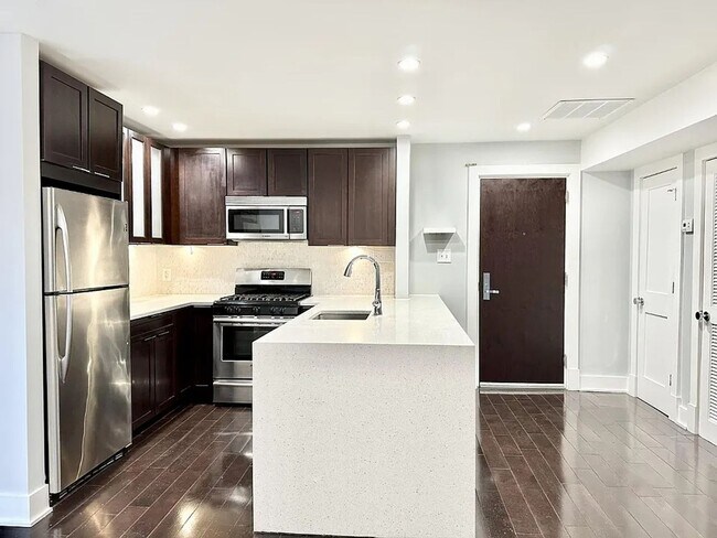 Building Photo - Sleek One-Bedroom in Eastern Market - Parking Spot Included!