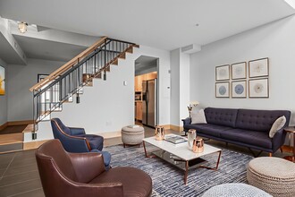 Building Photo - Modern 1-Bed 1.5-Bath + Den Condo in Minne...