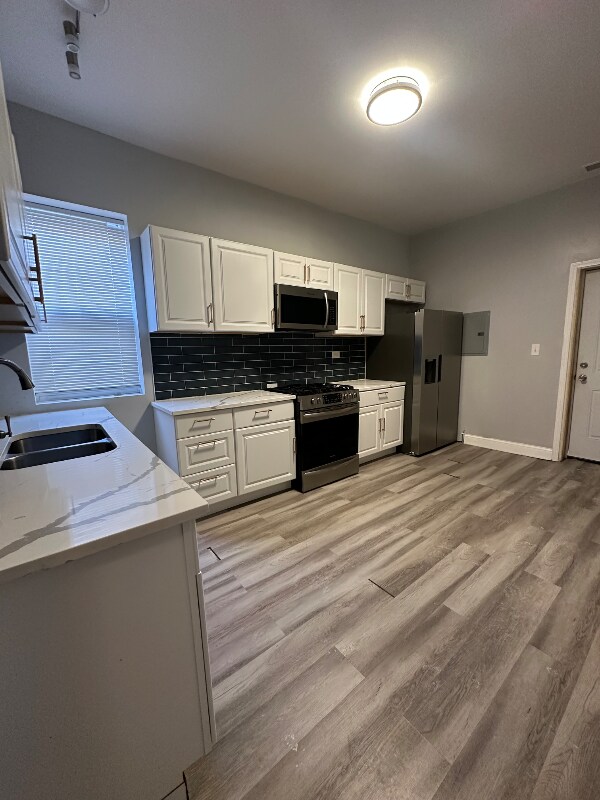 Building Photo - 7627 S Lowe Ave