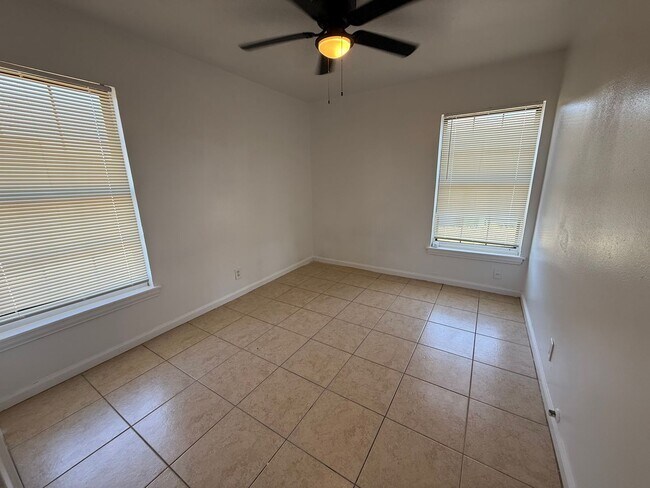 Building Photo - Charming 3BR Home w/ Hardwood Floors & Private Yard – Great SA Location