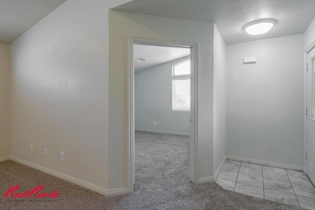 Building Photo - Fresh Carpet! Spacious 5-Bedroom Townhome