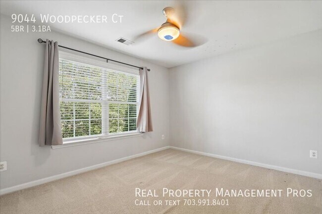Building Photo - 9044 Woodpecker Ct