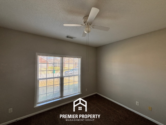 Building Photo - Charming 3BR Tuscaloosa Home | Hardwood Floors, Brick Fireplace, 2-Car Garage & Fenced Yard