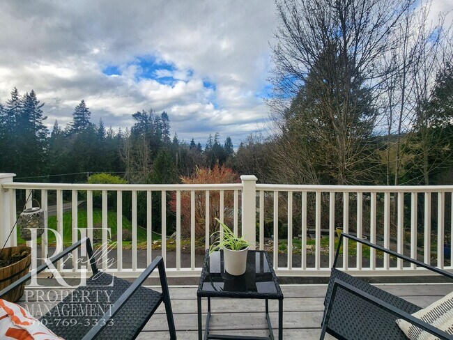 Building Photo - Light-Filled View Home with Vaulted Ceilings & Warm Wood Finishes