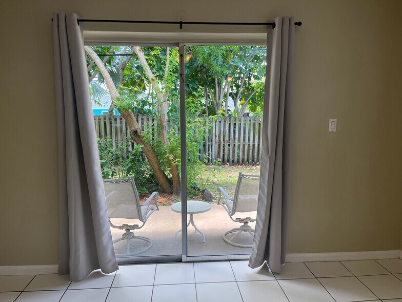 View of yard and patio from living room - 419 Ocean Ave