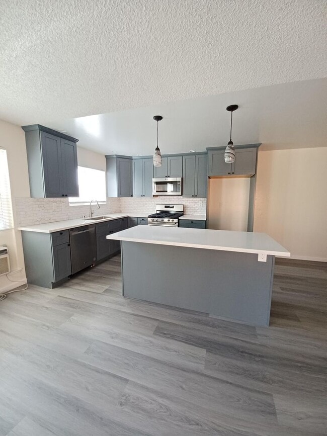 Building Photo - Beautiful 4-Bedroom Home with Spacious Lay...