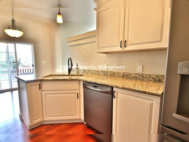 Building Photo - Large patio home with partially finished basement, attached 2-car garage!