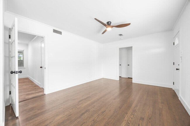 Building Photo - **$40K+ IN UPGRADES AND A FENCED BACKYARD WITH TWO STORAGE BUILDINGS**