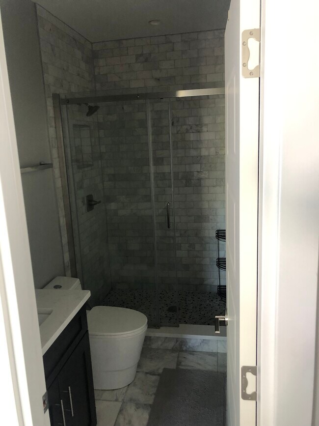 1/3 bathrooms (all look similar and one has a tub) - 614 I St NE