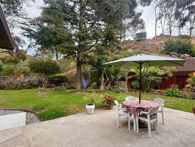 Building Photo - Bay Park Beauty | 3BD/2BA with Canyon Views & Lush Grounds