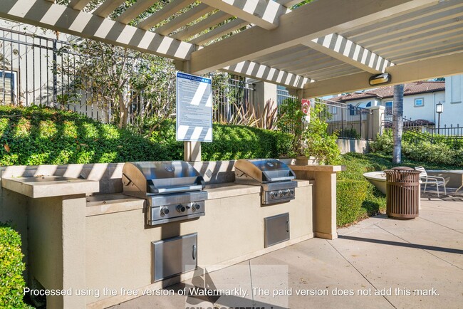 Building Photo - Welcome to this stunning 2-bedroom condo in gated community