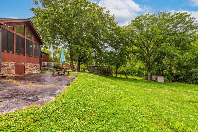 Building Photo - Charming ranch on a large lot with mature ...