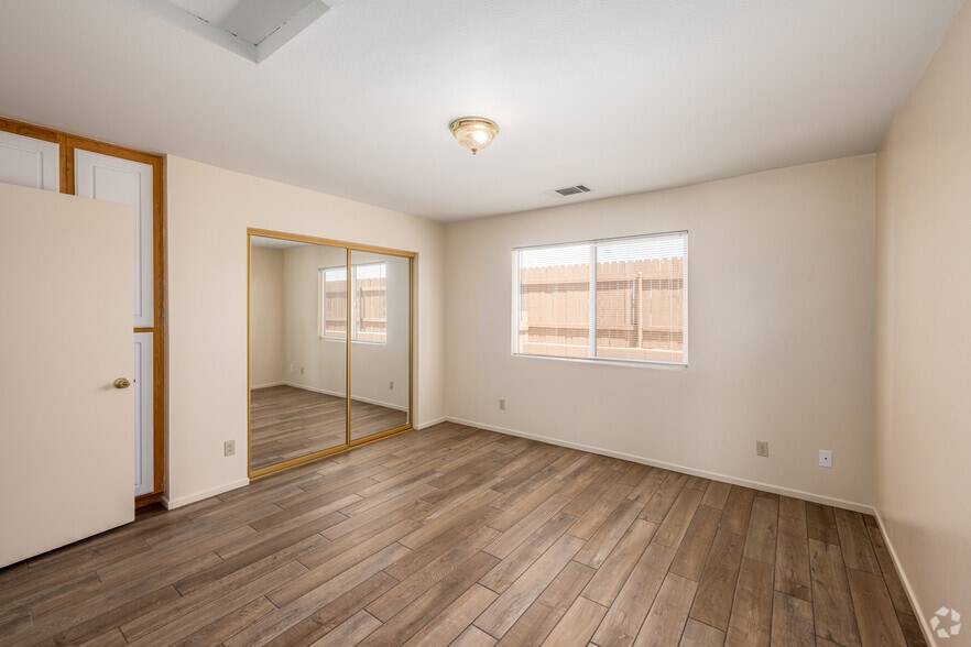 2BR, 1.5BA - 868SF - Primary Bedroom - Desert Breeze Apartments