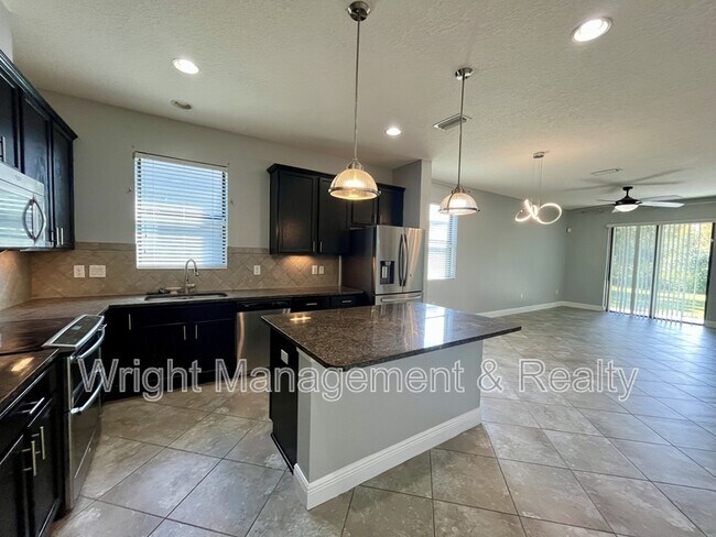 Building Photo - 5475 Angelonia Terrace