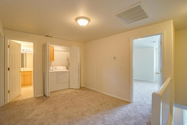 Building Photo - THREE BEDROOM TOWNHOME WITH GARAGE ACROSS FROM SHOPPING AND DINING