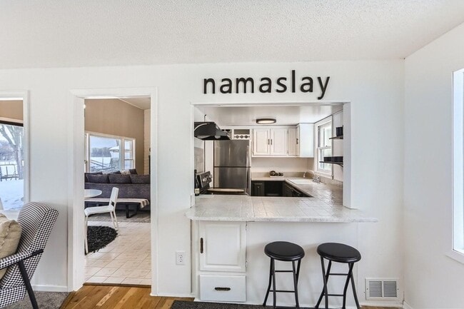 Building Photo - 5636 Twin Lake Terrace N