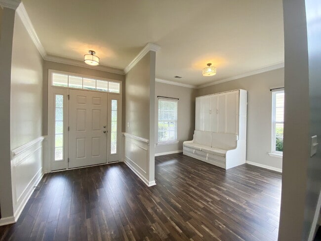 Building Photo - Three Bedroom Home with fenced-in Backyard oasis!