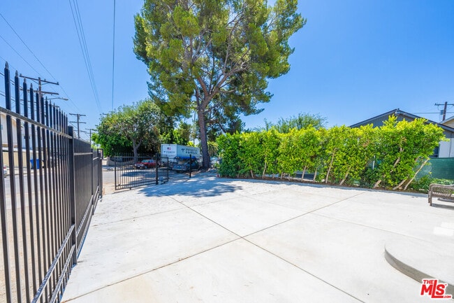 Building Photo - 5837 Cartwright Ave