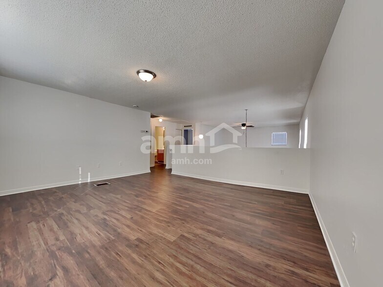 Building Photo - 6686 Gentle Oaks Dr E