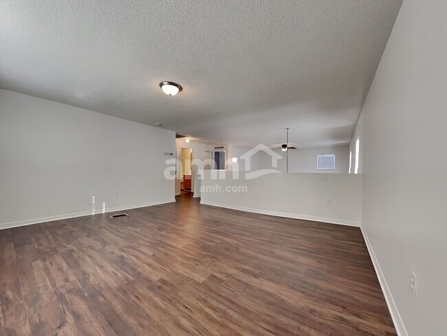 Building Photo - 6686 Gentle Oaks Dr E