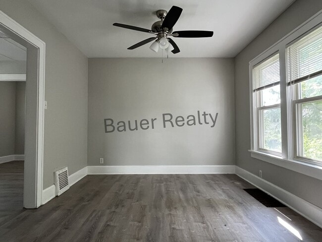 Building Photo - Three bedroom home with two car, detached garage!