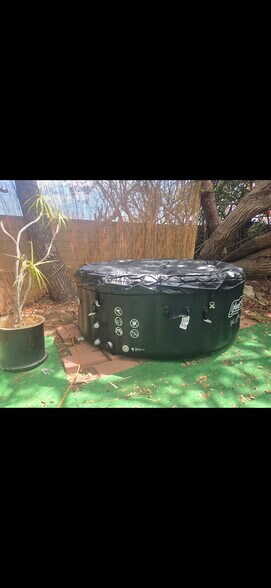 Four person jacuzzi hot tub - 7116 W 91st St