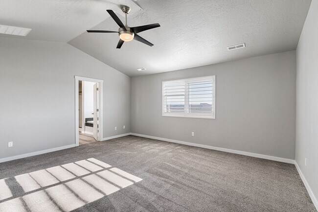 Building Photo - Custom Hunter-Douglas shutters throughout.