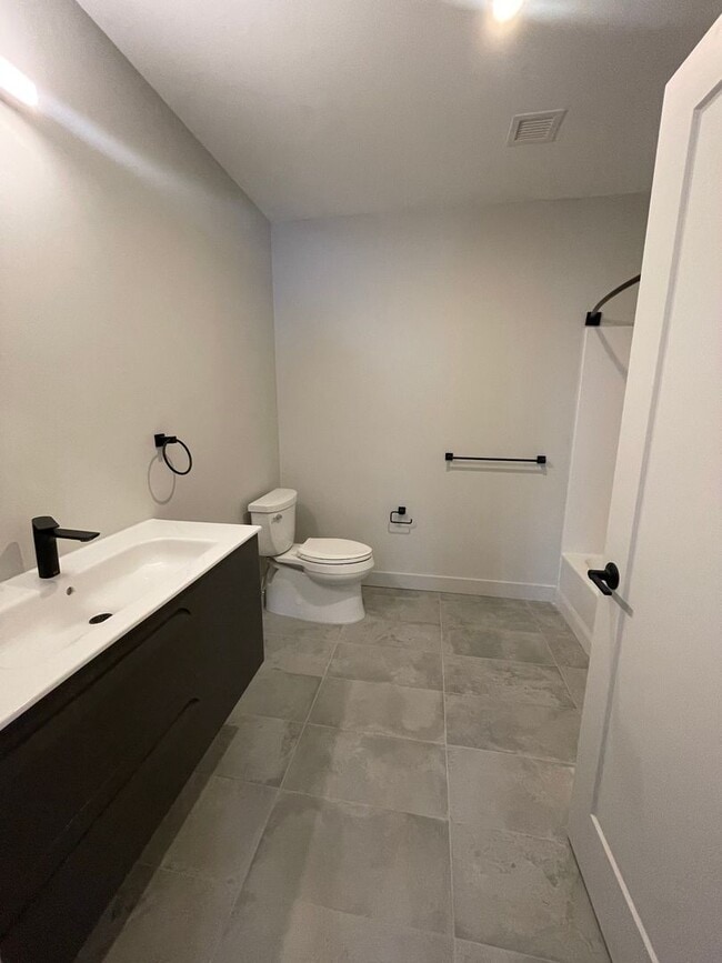 Building Photo - New construction condo available now!