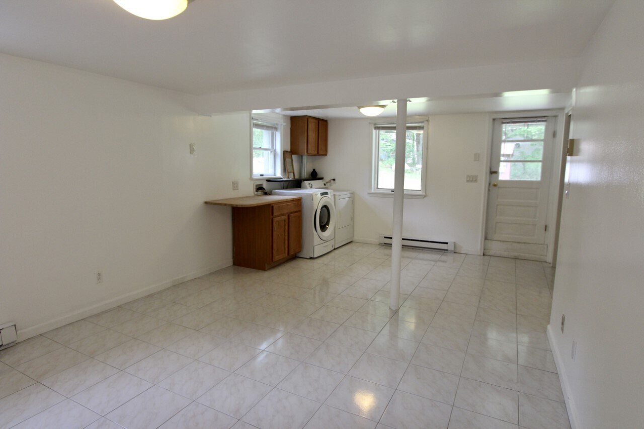 Lower Level family room / laundry with bath - 6 Rocky Ridge Rd