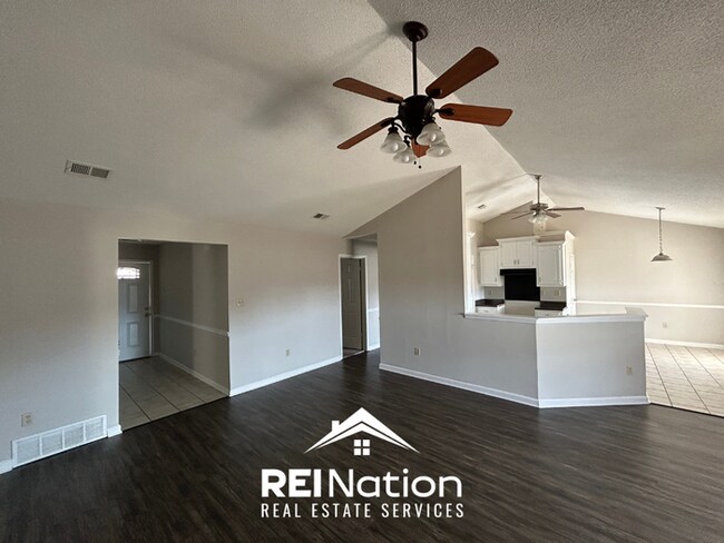 Building Photo - HORN LAKE STUNNER! 3BR/2BA | Vaulted Ceilings & Fireplace | Covered Patio & Garage!