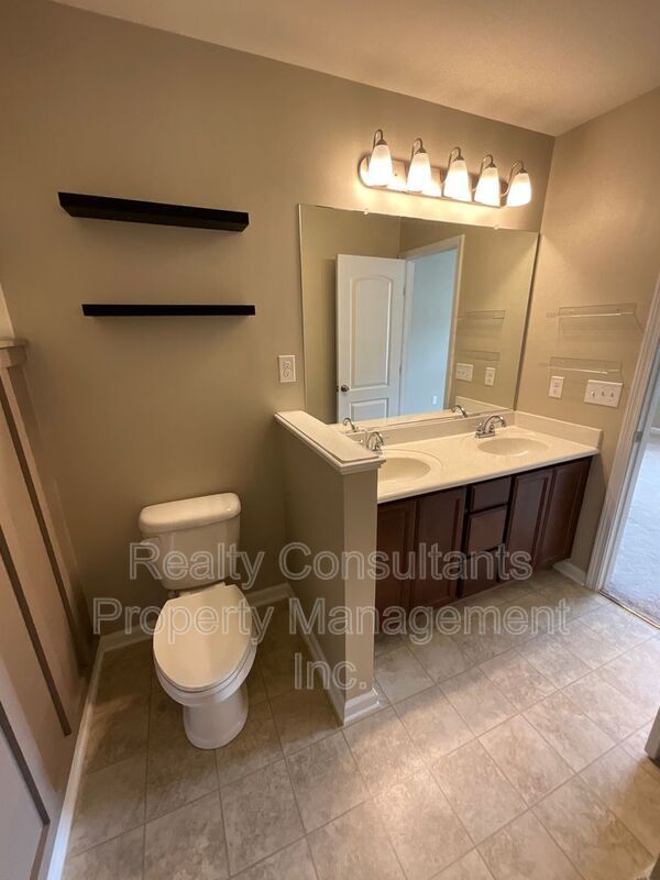 Building Photo - 6143 Trotting Pl