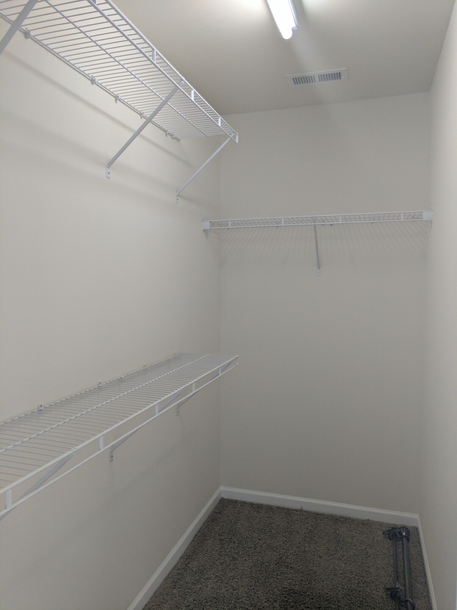 Master bedroom walk-in closet - 205 Spring Gardens Drive