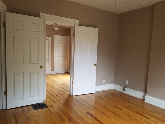 Open door between master bedroom and living room - 2473 W Argyle Pl