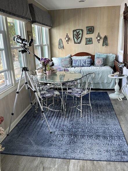 Daybed on porch facing lake - 123 S Ferry Dr